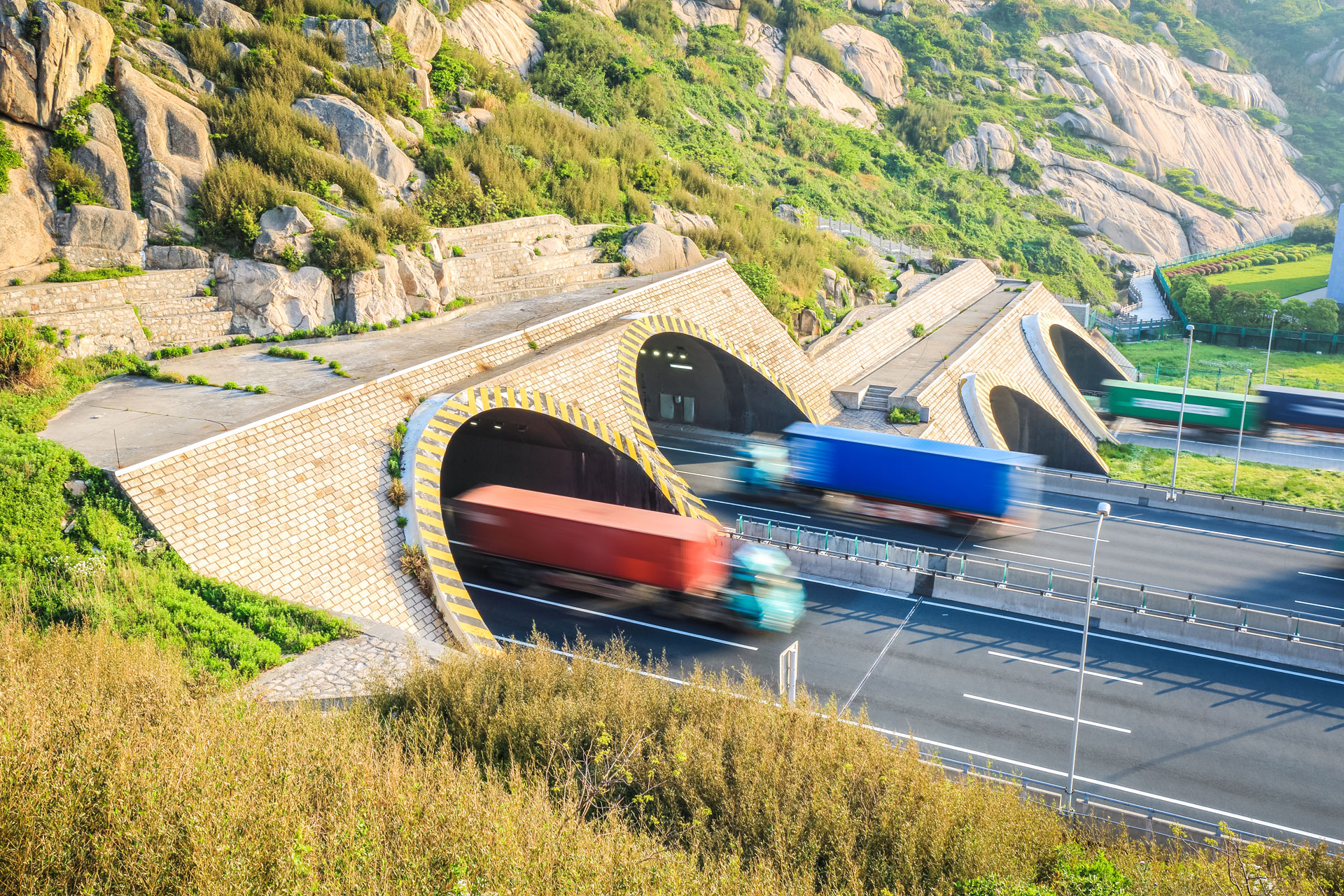trucks motion blur in tunnel exit