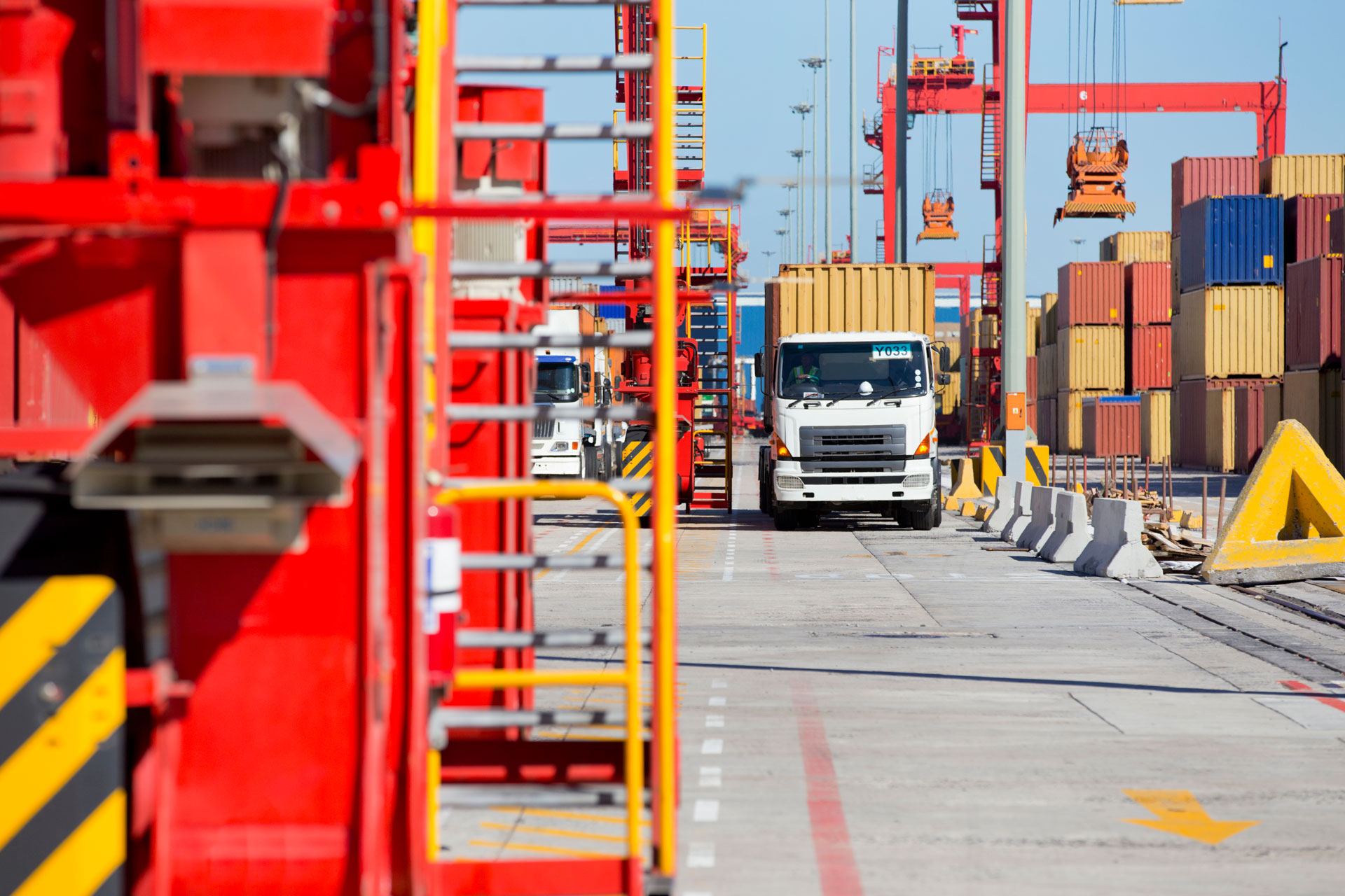 trucks transporting cargos from a dockyard